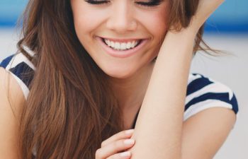 Smiling woman with beautiful hair.